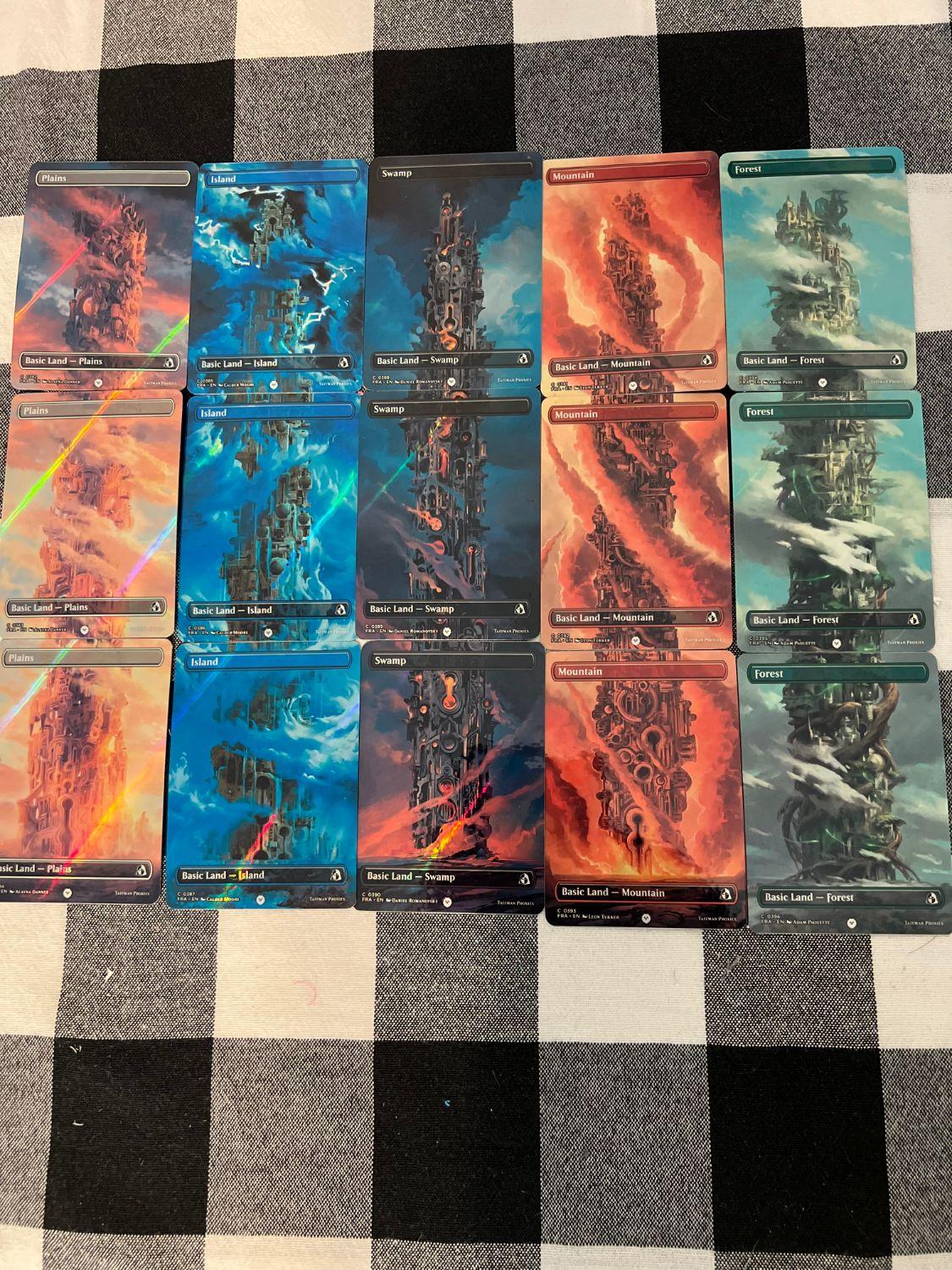 The full-art basic land cycle in foil.