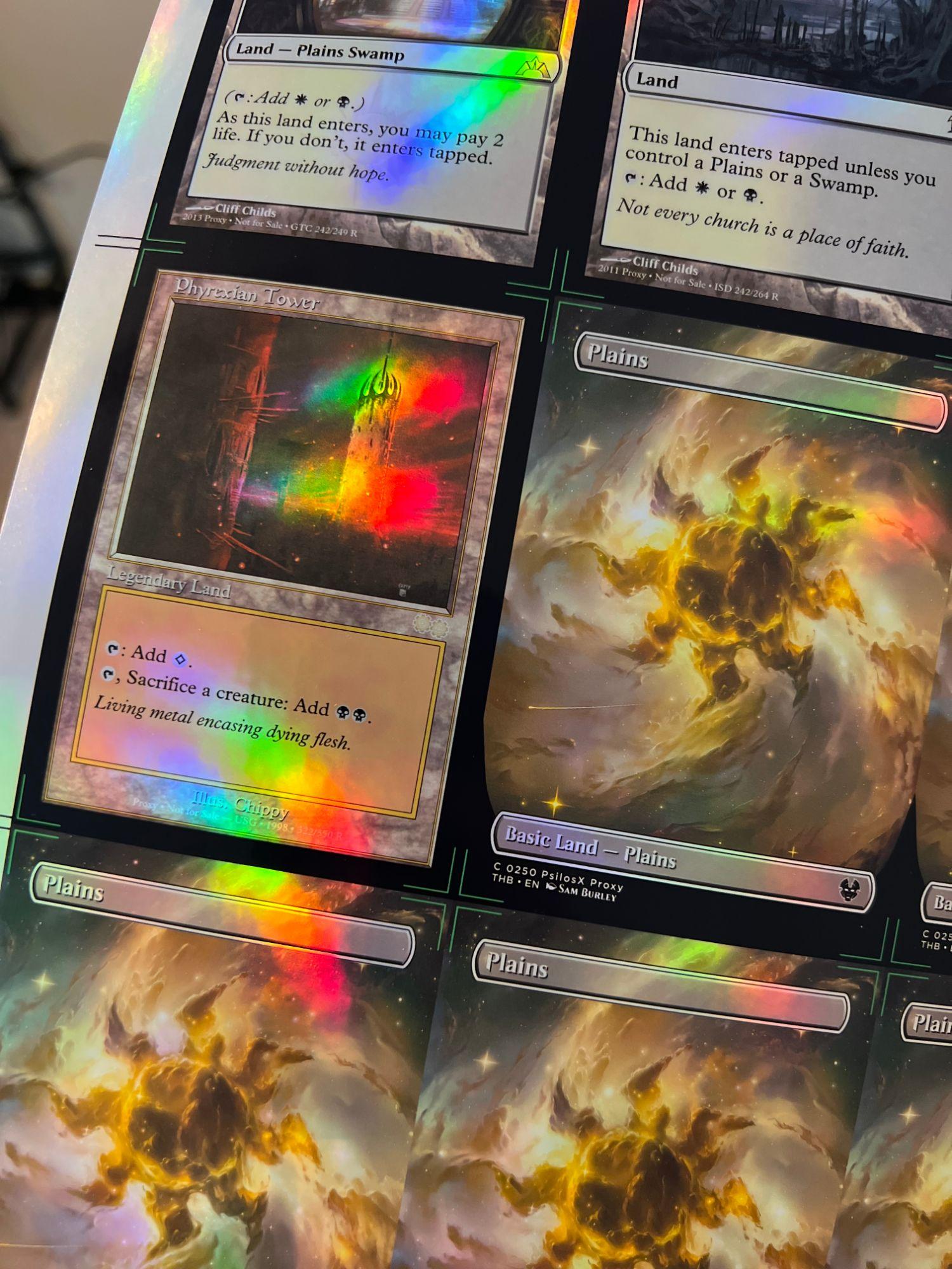Any frame your file calls for: old-border Phyrexian Tower beside a full-art Plains.
